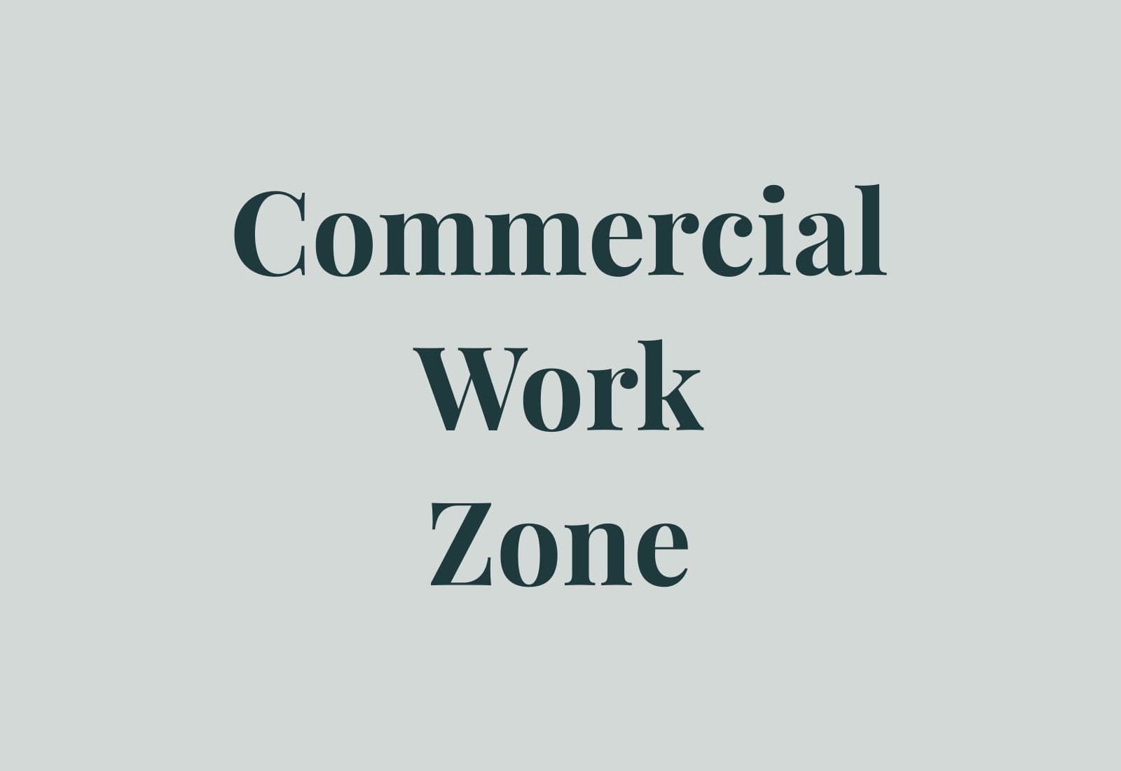 Commercial interior work zone with integrated storage, circulation, and durable lighting strategy.